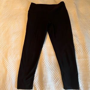 XS black cropped MPG running pants with reflective accent